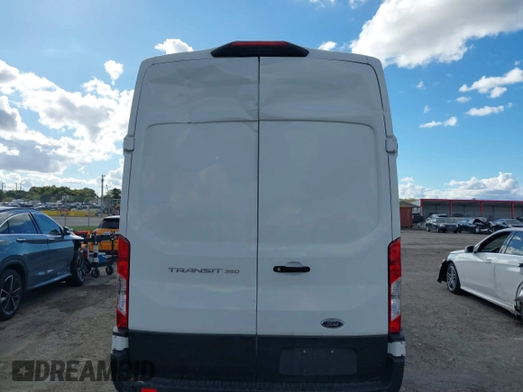 2021 Ford Transit Cargo with VIN 1FTBW3X8XMKA14051, listed as a IAAI auction lot 41672248 with 127,438 mi miles. Bid and sale history available at carsss.com. Image 17.