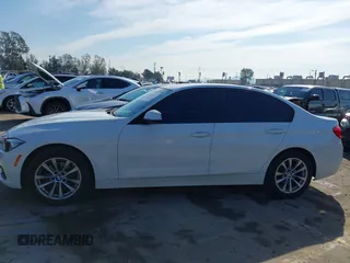 2016 BMW 3 Series 320i with VIN WBA8A9C59GK615704, listed as a IAAI auction lot 41431347 with 76,827 mi miles. Bid and sale history available at carsss.com. Image 14.