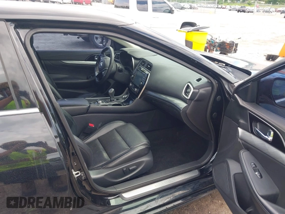 2016 Nissan Maxima SR with VIN 1N4AA6AP2GC901904, listed as a IAAI auction lot 42523722 with 114,235 mi miles and . Bid and sale history available at DreamBid. Image 5.