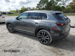 2023 Mazda CX-50 S Premium Plus with VIN 7MMVABEM2PN128862, listed as a Copart auction lot 45869665 with 23,177 mi miles and Salvage Title. Bid and sale history available at DreamBid. Image 2.