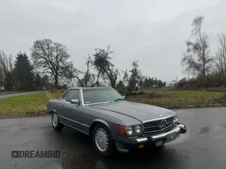 1987 Mercedes-Benz 560 SL with VIN WDBBA48D4HA059822, listed as a Copart auction lot 85827514 with 128,288 mi miles and Clean Title. Bid and sale history available at carsss.com. Image 1.
