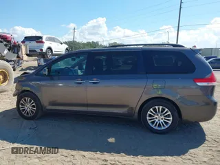 2012 Toyota Sienna XLE AAS with VIN 5TDYK3DC1CS186331, listed as a IAAI auction lot 41545031 with 240,788 mi miles and . Bid and sale history available at DreamBid. Image 14.