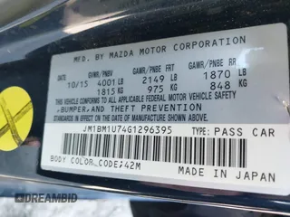 2016 Mazda 3 i Sport with VIN JM1BM1U74G1296395, listed as a IAAI auction lot 41765448 with 162,440 mi miles and . Bid and sale history available at DreamBid. Image 9.