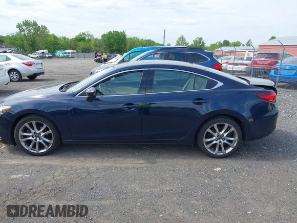 2015 Mazda 6 i Grand Touring with VIN JM1GJ1W53F1200121, listed as a IAAI auction lot 42173036 with 76,184 mi miles and . Bid and sale history available at DreamBid. Image 14.