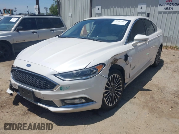 2017 Ford Fusion Titanium z VIN 3FA6P0SU0HR329224, wystawiony jako IAAI lot #42291605 z przebiegiem 176 728 mil mil oraz . Historia ofert i sprzedaży dostępna na DreamBid. Obrazek 20.