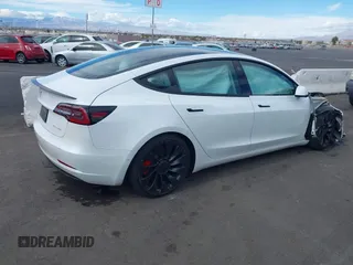 2022 Tesla Model 3 Performance with VIN 5YJ3E1EC6NF111958, listed as a IAAI auction lot 41583972 with 28,431 mi miles and . Bid and sale history available at DreamBid. Image 4.