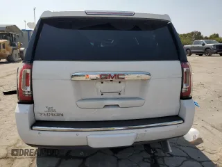 2019 GMC Yukon Denali with VIN 1GKS1CKJ7KR194428, listed as a Copart auction lot 71191064 with 56,409 mi miles and Salvage Title. Bid and sale history available at carsss.com. Image 6.