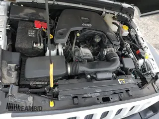 2019 Jeep Wrangler Sport S z VIN 1C4GJXAG1KW614085, wystawiony jako Copart lot #62818985 z przebiegiem 47 539 mil mil oraz Szkoda całkowita • Salvage title. Historia ofert i sprzedaży dostępna na DreamBid. Obrazek 16.