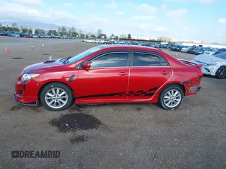 2009 Toyota Corolla with VIN 1NXBU40EX9Z027482, listed as a IAAI auction lot 42149978 with 164,318 mi miles. Bid and sale history available at carsss.com. Image 14.