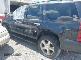 2012 Chevrolet Tahoe LT with VIN 1GNSCBE05CR211898, listed as a IAAI auction lot 42612993 with 233,367 mi miles and . Bid and sale history available at DreamBid. Image 3.