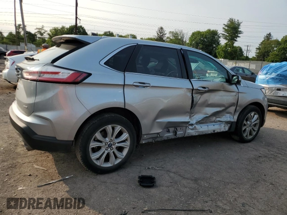 2021 Ford Edge Titanium with VIN 2FMPK4K91MBA12380, listed as a Copart auction lot 59275785 with 82,295 mi miles and Salvage title. Bid and sale history available at DreamBid. Image 3.