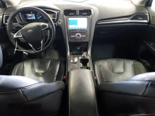 2020 Ford Fusion Titanium with VIN 3FA6P0RUXLR182408, listed as a Copart auction lot 56897105 with 100,021 mi miles and Salvage title. Bid and sale history available at DreamBid. Image 8.