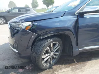 2018 GMC Terrain Denali with VIN 3GKALXEX9JL256723, listed as a IAAI auction lot 42398296 with 122,134 mi miles and . Bid and sale history available at DreamBid. Image 6.