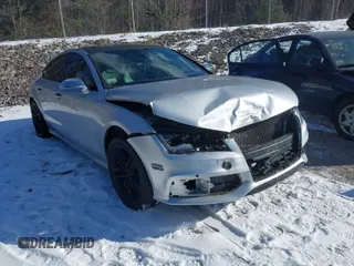 2015 Audi S7 with VIN WAUW2AFC0FN023556, listed as a IAAI auction lot 41316481 with 70,737 mi miles. Bid and sale history available at carsss.com. Image 1.