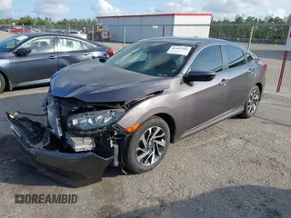 2017 Honda Civic EX z VIN 2HGFC2F75HH564169, wystawiony jako IAAI lot #41482206 z przebiegiem 93 363 mil mil oraz . Historia ofert i sprzedaży dostępna na DreamBid. Obrazek 2.