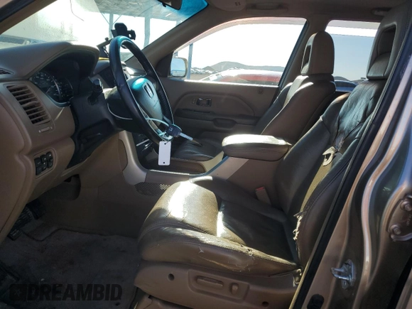 2005 Honda Pilot EX-L z VIN 5FNYF18525B064752, wystawiony jako Copart lot #56022115 z przebiegiem 221 161 mil mil oraz Szkoda całkowita • Salvage title. Historia ofert i sprzedaży dostępna na DreamBid. Obrazek 7.