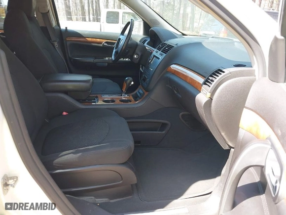 2007 Saturn Outlook XR with VIN 5GZER33747J128721, listed as a IAAI auction lot 41897606 with 90,699 mi miles. Bid and sale history available at carsss.com. Image 5.