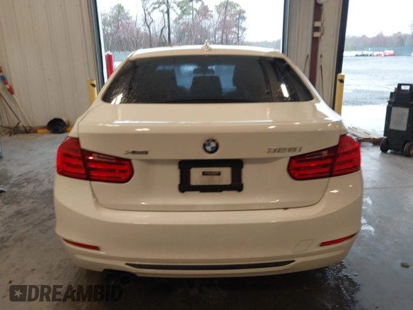 2014 BMW 3 Series 328i xDrive with VIN WBA3B5C53EP543964, listed as a IAAI auction lot 41856923 with 149,440 mi miles. Bid and sale history available at carsss.com. Image 16.