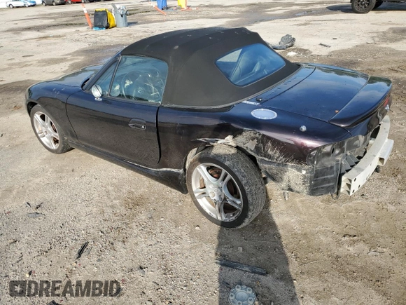 2004 Mazda MX-5 Miata LS with VIN JM1NB353140408906, listed as a Copart auction lot 56664715 with 86,603 mi miles and Salvage title. Bid and sale history available at DreamBid. Image 2.