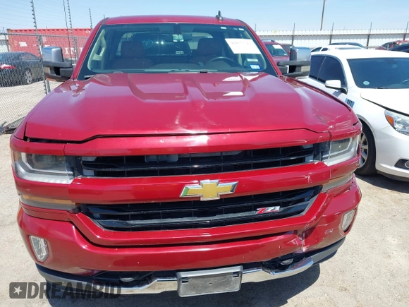 2017 Chevrolet Silverado 1500 LT with VIN 3GCUKREC4HG164281, listed as a IAAI auction lot 42037712 with 133,935 mi miles and . Bid and sale history available at DreamBid. Image 12.