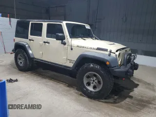 2012 Jeep Wrangler Unlimited Call of Duty MW3 with VIN 1C4BJWFGXCL105130, listed as a Copart auction lot 85747614 with 77,953 mi miles and Salvage title. Bid and sale history available at DreamBid. Image 4.