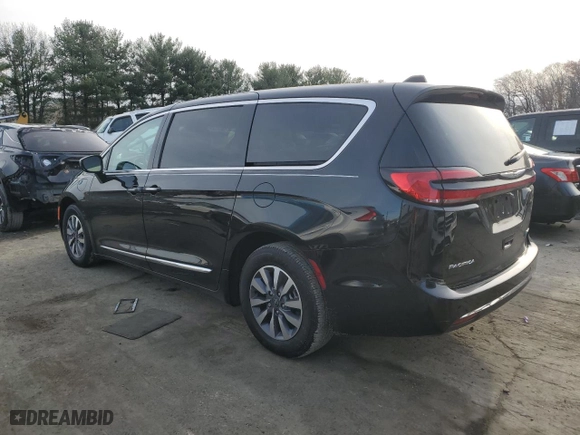 2023 Chrysler Pacifica Hybrid Limited with VIN 2C4RC1S77PR599221, listed as a Copart auction lot 82690554 with 12,013 mi miles and Salvage Title. Bid and sale history available at carsss.com. Image 2.