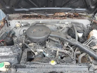 1988 Nissan Hardbody z VIN 1N6ND11S7JC388518, wystawiony jako IAAI lot #41839764 z przebiegiem 72 926 mil mil oraz . Historia ofert i sprzedaży dostępna na DreamBid. Obrazek 10.