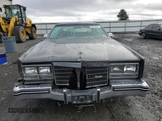 1984 Cadillac Eldorado z VIN 1G6AL5781EE619594, wystawiony jako Copart lot #80918934 z przebiegiem 47 529 mil mil oraz Szkody całkowita. Historia ofert i sprzedaży dostępna na DreamBid. Obrazek 5.