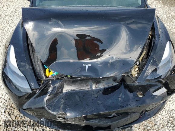 2023 Tesla Model 3 z VIN 5YJ3E1EA4PF559424, wystawiony jako Copart lot #55277575 z przebiegiem 59 886 mil mil oraz Szkoda całkowita • Salvage title. Historia ofert i sprzedaży dostępna na DreamBid. Obrazek 11.
