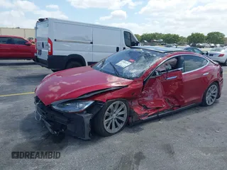 2016 Tesla Model S 70 with VIN 5YJSA1E16GF135833, listed as a IAAI auction lot 42084421 with 97,615 mi miles and . Bid and sale history available at DreamBid. Image 2.