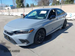 2022 Honda Civic Sport with VIN 2HGFE2F57NH600299, listed as a IAAI auction lot 41709059 with 9,060 mi miles and . Bid and sale history available at carsss.com. Image 19.