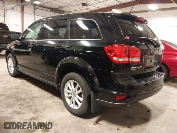 2015 Dodge Journey SXT with VIN 3C4PDDBG5FT518699, listed as a IAAI auction lot 41887477 with 118,966 mi miles and . Bid and sale history available at DreamBid. Image 3.
