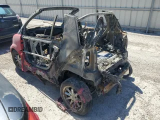 2009 Smart fortwo Passion z VIN WMEEK31X99K211682, wystawiony jako Copart lot #54110385 z przebiegiem Nie podano mil oraz Szkoda całkowita • Salvage title. Historia ofert i sprzedaży dostępna na DreamBid. Obrazek 2.