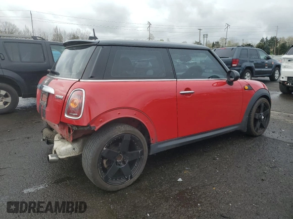 2009 MINI Hardtop with VIN WMWMF33509TU73771, listed as a Copart auction lot 51156025 with 119,622 mi miles and Salvage Title. Bid and sale history available at DreamBid. Image 3.