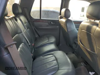 2004 GMC Envoy SLT with VIN 1GKDT13S942407244, listed as a Copart auction lot 70995064 with 162,676 mi miles and Salvage Title. Bid and sale history available at carsss.com. Image 10.