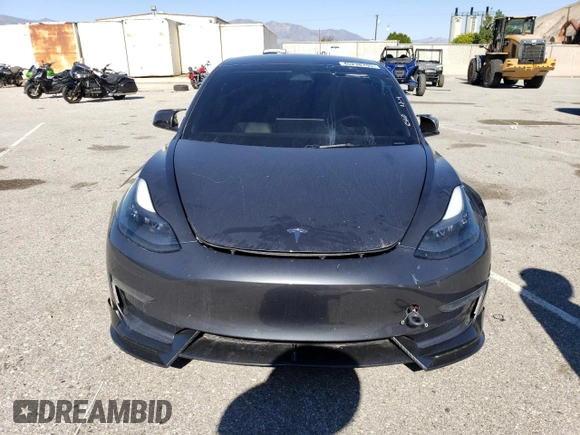 2023 Tesla Model 3 Long Range with VIN 5YJ3E1EB4PF633935, listed as a Copart auction lot 45238705 with 32,972 mi miles and Salvage Title. Bid and sale history available at DreamBid. Image 5.