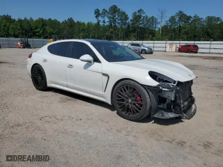 2016 Porsche Panamera 4 with VIN WP0AA2A79GL000127, listed as a Copart auction lot 56220614 with 76,065 mi miles and Salvage Title. Bid and sale history available at carsss.com. Image 4.