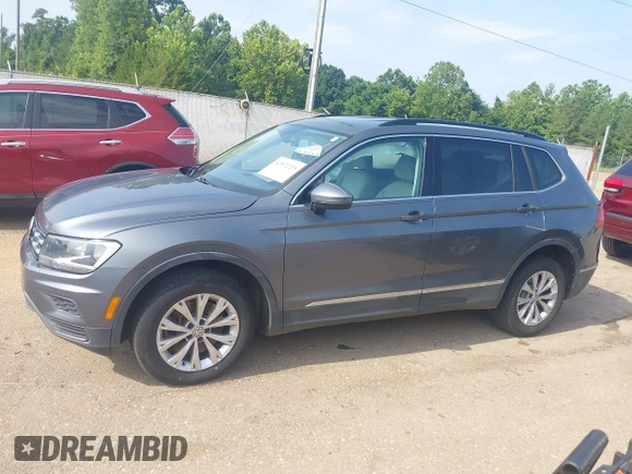 2018 Volkswagen Tiguan SEL z VIN 3VV3B7AX1JM045203, wystawiony jako IAAI lot #42572229 z przebiegiem 104 873 mil mil oraz . Historia ofert i sprzedaży dostępna na DreamBid. Obrazek 14.