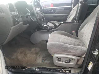 2004 GMC Envoy SLT with VIN 1GKDT13S042310076, listed as a Copart auction lot 79965854 with 220,506 mi miles and Salvage Title. Bid and sale history available at carsss.com. Image 7.