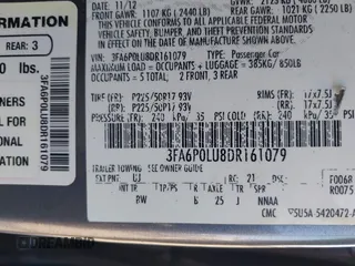 2013 Ford Fusion SE Hybrid with VIN 3FA6P0LU8DR161079, listed as a IAAI auction lot 42064615 with 232,448 mi miles. Bid and sale history available at carsss.com. Image 9.