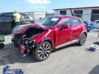 2019 Mazda CX-3 Grand Touring with VIN JM1DKFD70K0431771, listed as a IAAI auction lot 41589257 with 90,119 mi miles. Bid and sale history available at carsss.com. Image 2.