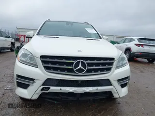 2014 Mercedes-Benz M 550 with VIN 4JGDA7DB1EA362659, listed as a IAAI auction lot 41704573 with 163,341 mi miles and . Bid and sale history available at carsss.com. Image 12.