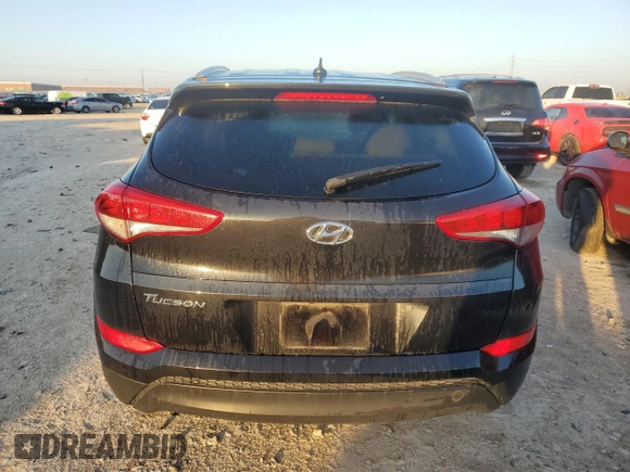 2016 Hyundai Tucson SE z VIN KM8J33A43GU093173, wystawiony jako Copart lot #41459245 z przebiegiem 120 991 mil mil oraz Szkoda całkowita • Salvage title. Historia ofert i sprzedaży dostępna na DreamBid. Obrazek 6.