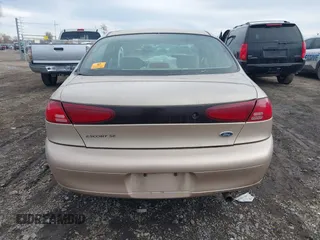 1999 Ford Escort SE with VIN 1FAFP13P3XW253542, listed as a IAAI auction lot 41691407 with 93,221 mi miles. Bid and sale history available at carsss.com. Image 16.