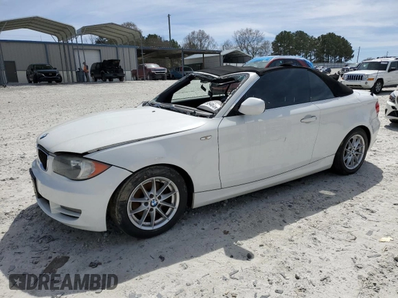 2010 BMW 1 Series 128i with VIN WBAUN1C5XAVH81789, listed as a Copart auction lot 49798465 with 128,859 mi miles and Clean title. Bid and sale history available at DreamBid. Image 1.