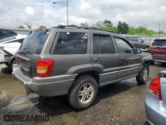 2000 Jeep Grand Cherokee Laredo с VIN 1J4G248S4YC299003, выставлен на аукционе Copart как лот 55937685 с пробегом Не указан миль и Списание • Salvage title. История ставок и продаж доступна на DreamBid. Изображение 3.