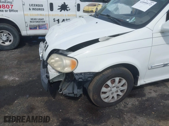 2005 Kia Sedona LX with VIN KNDUP132056702484, listed as a IAAI auction lot 42099572 with 195,528 mi miles and . Bid and sale history available at DreamBid. Image 6.