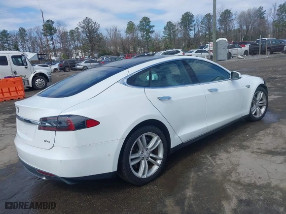 2016 Tesla Model S 90D with VIN 5YJSA1E21GF129964, listed as a IAAI auction lot 41817494 with NaN miles. Bid and sale history available at carsss.com. Image 4.