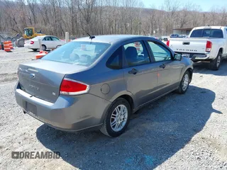 2010 Ford Focus SE with VIN 1FAHP3FN7AW233123, listed as a IAAI auction lot 41892154 with 285,214 mi miles. Bid and sale history available at carsss.com. Image 4.