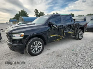 2020 Ram 1500 Laramie with VIN 1C6SRFJT5LN178284, listed as a Copart auction lot 61813575 with 90,699 mi miles and Salvage title. Bid and sale history available at DreamBid. Image 1.